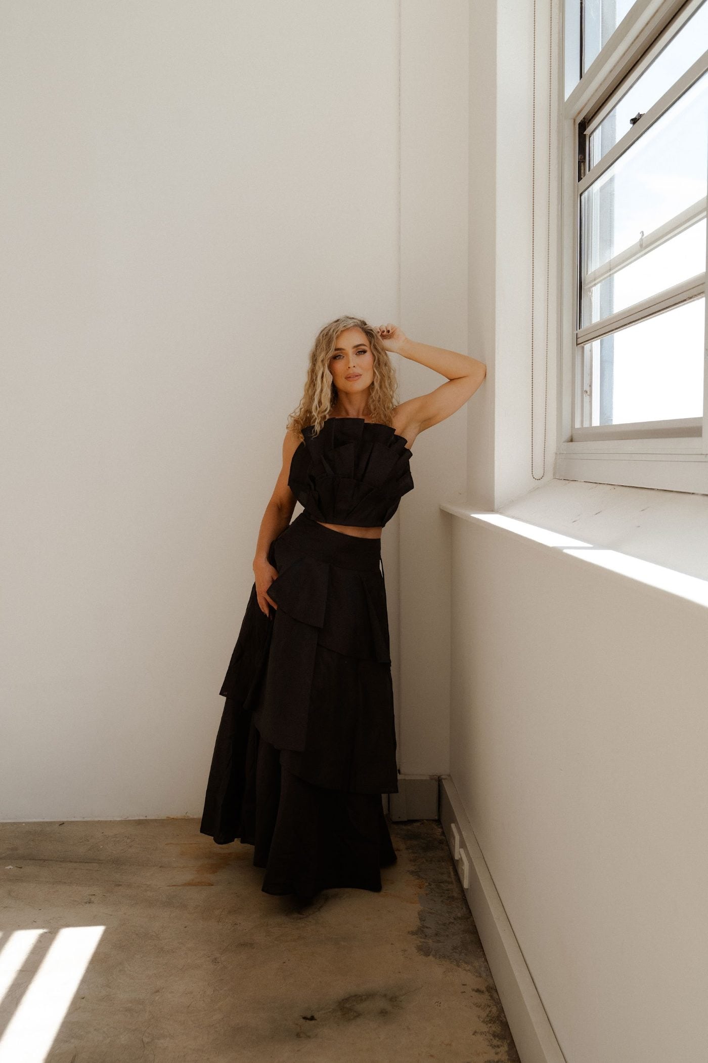 Kristin Meldrum standing by a window
